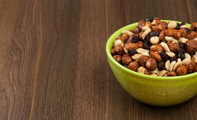 Healthy And Tasty Snack; Mixture of peanuts, raisins, and peanuts Covered With Honey.