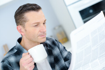 a man is drinking coffee