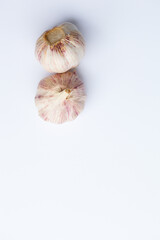 two head of garlic isolated on white background