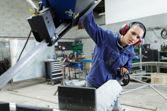 Woman Cutting Steel With Blow Torch