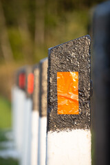 Photo of fences by the road.