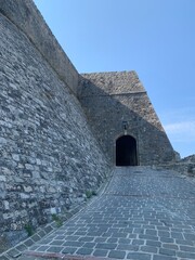 Fototapeta na wymiar Ancient stone wall. fortress Kalaja in Ulcinj town, Montenegro. Medieval citadel.