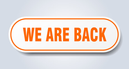 we are back sign. rounded isolated button. white sticker