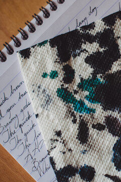 Ink blots and a notepad