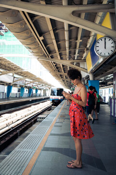 Woman Waiting for the Train