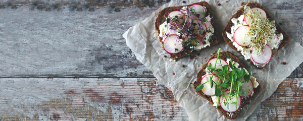Healthy toast with microgreens and radishes. Diet food. Keto toast. Selective focus. Macro.