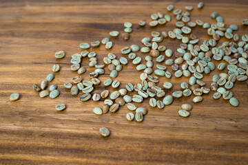 green coffee on wooden table