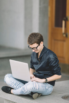 woman using a laptop .