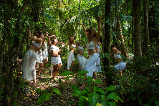 Group of Women Ecstatically Dancing in the Jungle