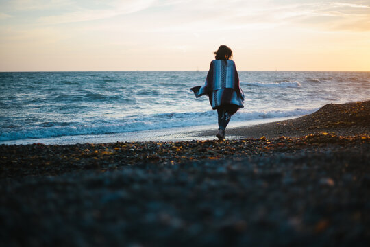 Beach Walk At Sunset