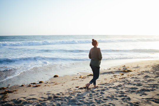 Beach Walk At Sunset