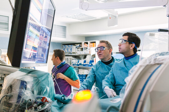 Doctors Operating Using Robot-Assisted Surgery