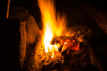 embers burn down in a hardwood fire