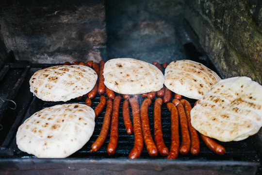 Sausages on open grill