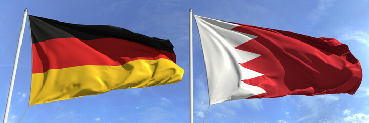 Flying flags of Germany and Bahrain on sky background, 3d rendering