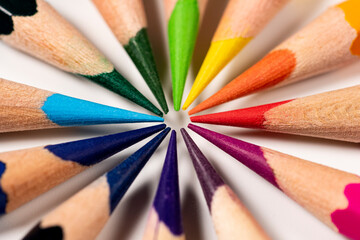 Colour pencils isolated on white background. Macro