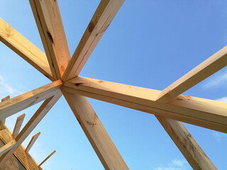 Wood girder beams for roof construction