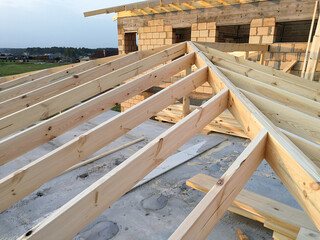 Wood girder beams for roof construction