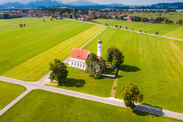 Aerial view of church near Schwangau on summer day, Forggensee in background