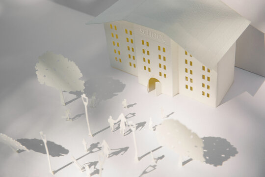 School building and surroundings with lights and shadows from above