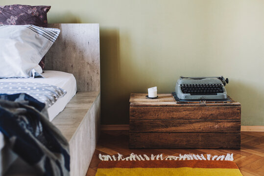 Detail shot of retro designed bedroom with typwriter