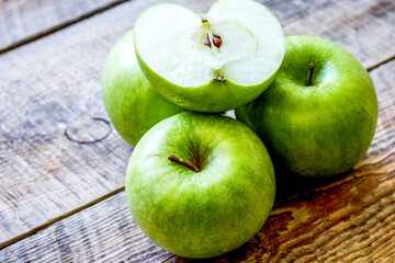 green apples for healthy dessert on wooden background