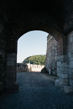Gellert hill in Budapest framed by an arch