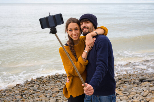 Lovers taking a selfie outdoors