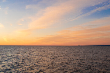 Fototapeta na wymiar Colorful sunrise colors in the sky, in the Chaleur bay, Canada