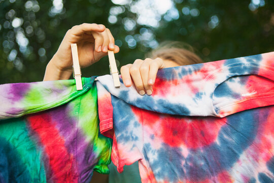 Tie Dye: Girl Puts Shirts Up To Dry