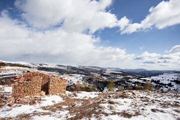 Ruined house in the snow