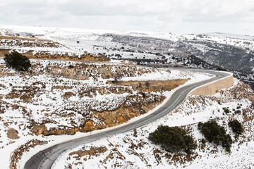 Curvy road in snowy Landscape