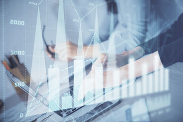 Multi exposure of woman hands typing on computer and financial chart hologram drawing. Stock market analysis concept.