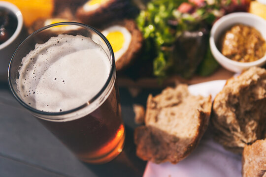 Pint Of Beer With British Ploughman's Plate