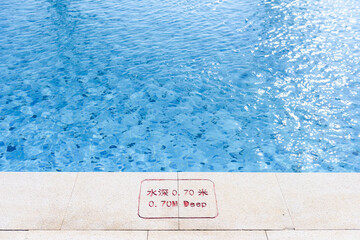 Blue and clean swimming pool edge