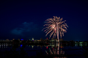 Harrisburg's 104th Kipona Festival 2020 - fireworks are set off from City Island. Here is a view of them and Riverfront Park from across the Susquehanna River. 