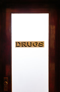 Drug sign on antique pharmacy door