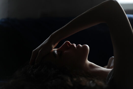 Portrait of a woman on contra light