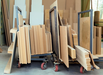 In the warehouse of the woodworking production there are wood blanks