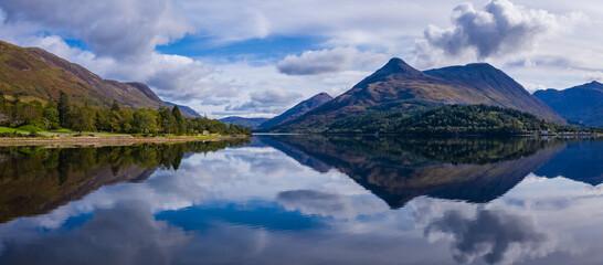 aerial view of loch linnhe in summer near duror and ballachulish and glencoe in the argyll region of the highlands of scotland showing blue water and green fertile coast line © Andy Morehouse