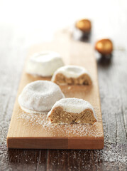 Gugelhupf cake cut on a wooden table