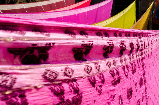 Colorful saris drying. India