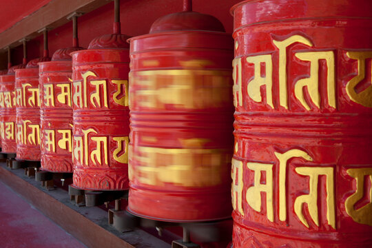 Spinning in motion prayer wheels.