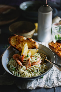 Shrimp pasta with garlic bread.