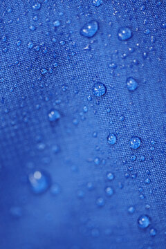 Wind and weatherproof fabric of a softshell mountaineering jacket.