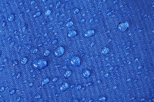 Wind and weatherproof fabric of a softshell mountaineering jacket.