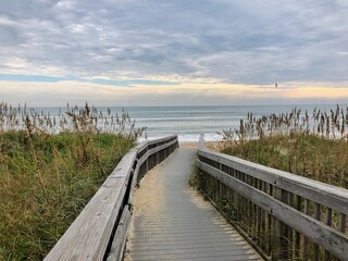 The wooden walkway leading out to the beach and ocean