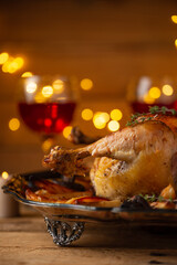 Festive Christmas dinner with baked turkey and glasses of wine. Christmas concept.Festive mood. Close-up.
