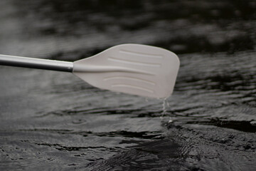 Paddle for rowing on water. Boat trip. 
