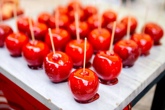 Just coated candy apples in a row for Halloween
